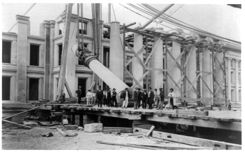 Construction of Treasury Building, Washington, D.C.- Men standing in front; column being raised into position, Sept. 16, 1867 LCCN96524468