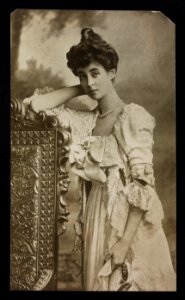 Consuelo Vanderbilt Balsan, three-quarter length portrait, leaning on high-back chair LCCN2017658398