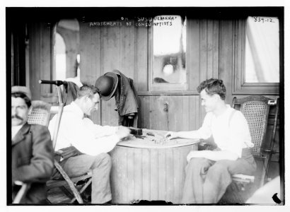 Consumptives playing dominoes aboard Susquehanna, ferryboat used for tuberculosis camp LCCN2014684058