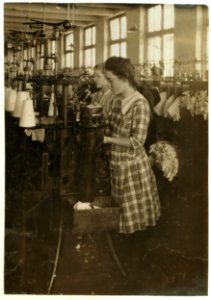 Continuation school girls topping stockings in Ipswich Mills. LOC nclc.03126