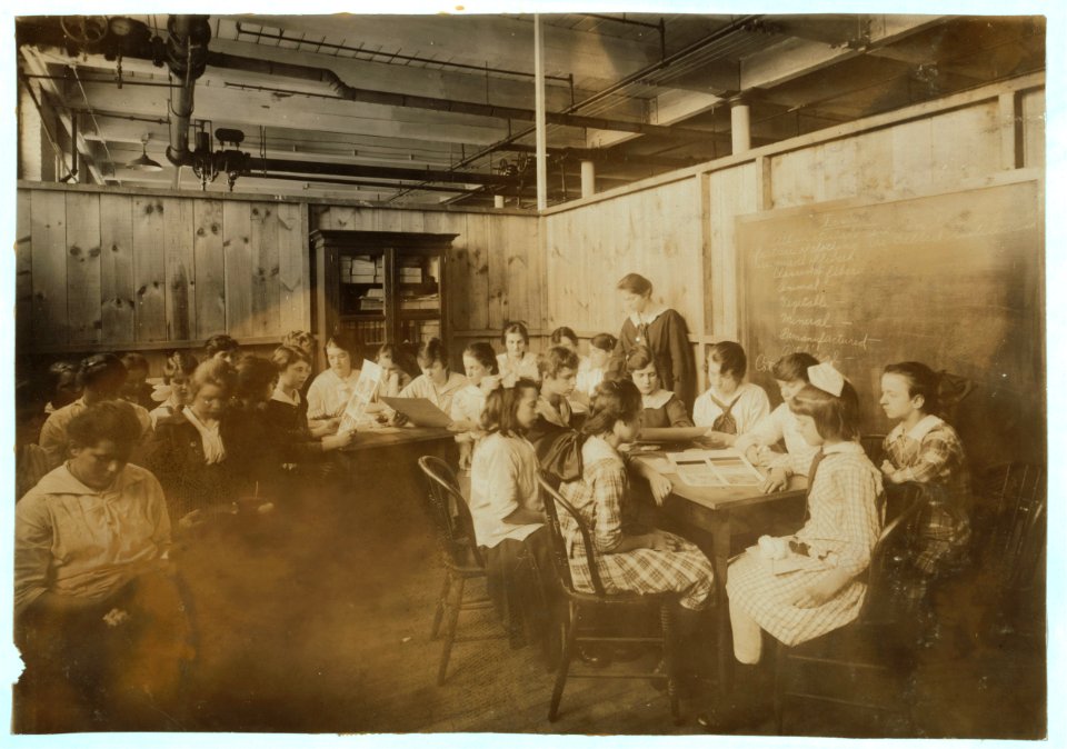 Continuation School group at Ipswich Mills, South Boston, studying textiles. LOC nclc.05202