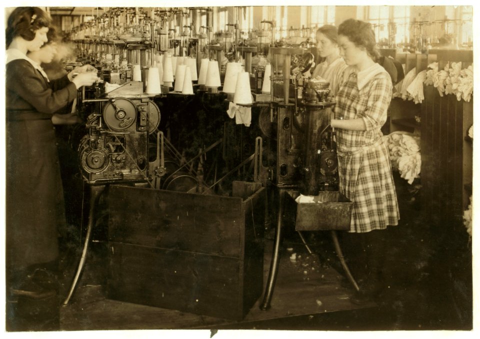Continuation school girls topping stockings in Ipswich Mills. LOC nclc.03125