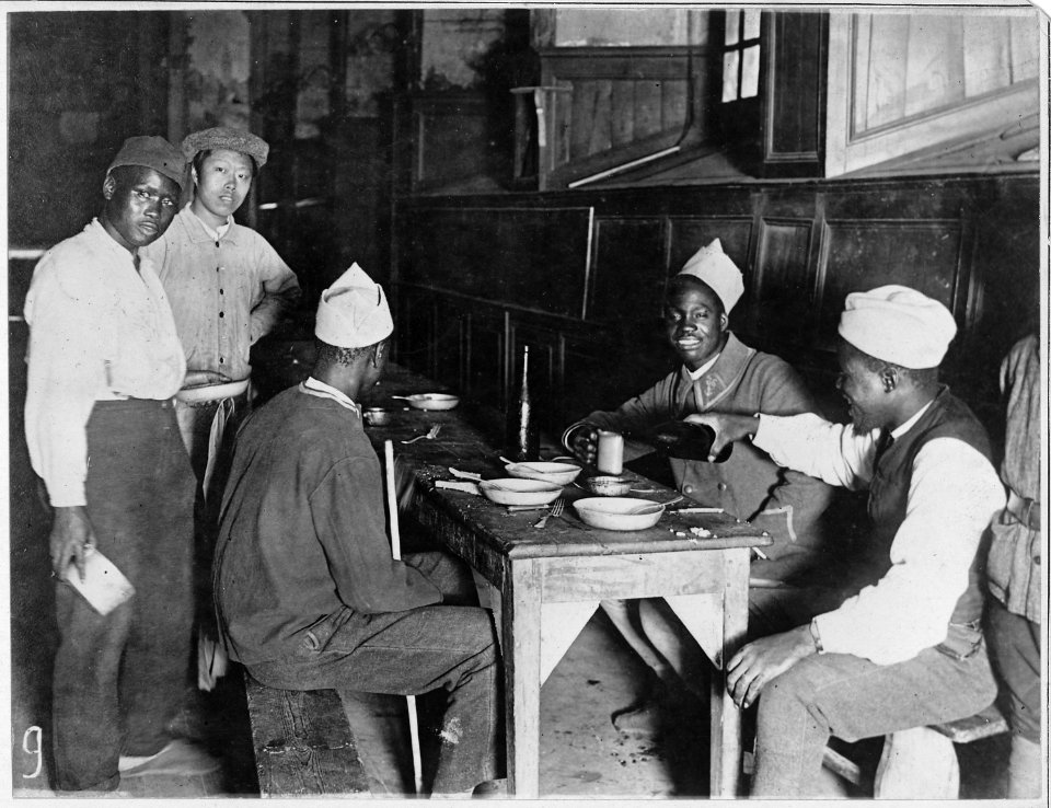 Convalescent Moroccan and Chinese workmen at mess in hospital at Dinan, France. - NARA - 533596