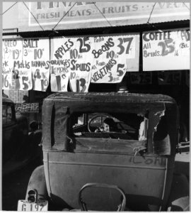 Coolidge, Arizona. Cotton picker's child comes to town with her family on Saturday afternoon for the . . . - NARA - 522267