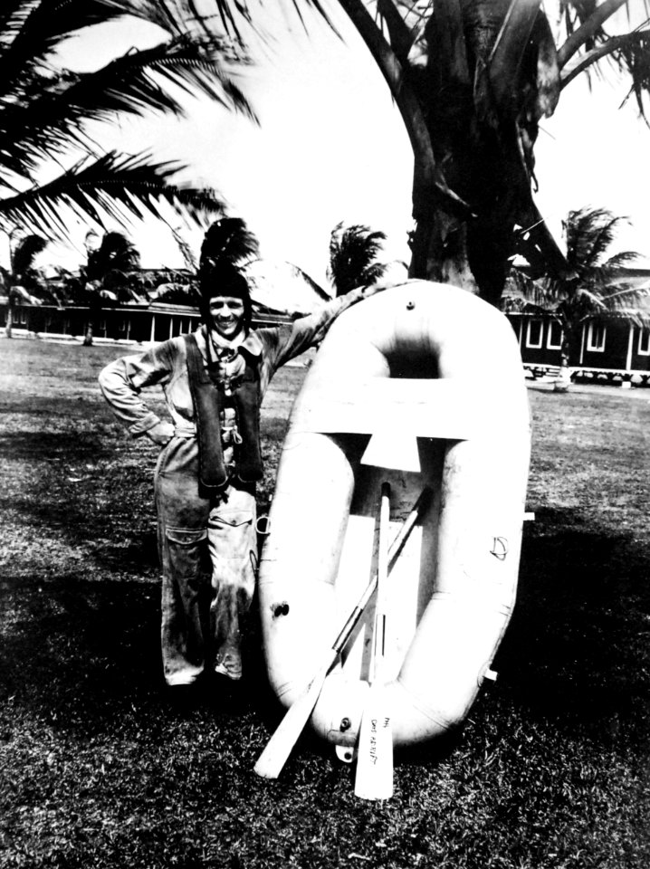 COP Verne Harshman, USN, with rubber boat in which he remained adrift for five days, 1931 (40691296200)