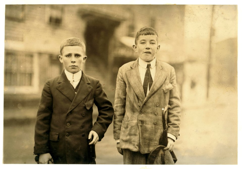 Cornelius Hurley, right end of picture, 68 Adam Street, been at work in No. 1 Mill room in Merrimac Mill, Lowell, Mass., for six months. About 13 or 14 probably. Michael Keefe, 32 Marion LOC nclc.02387