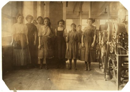 Cornell Mill. Smallest girl in group is Jennie Sylvia, 522 Alden St., a doffer in card room of Cornell Mill. I saw a girl, apparently as young, running a loom in weave room there. LOC nclc.02497