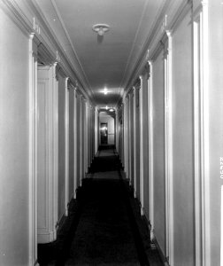 Corridor in First Class accommodation on the 'Aquitania' (1914) RMG G10930