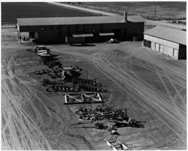 Cortaro Farms, Pinal County, Arizona. Part of equipment yard seen from water tower. - NARA - 522501