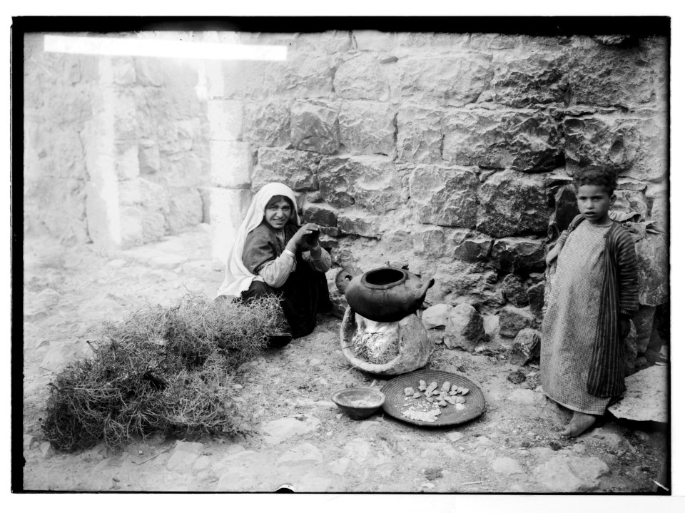 Costumes, characters, etc. Cooking the evening meal LOC matpc.05608