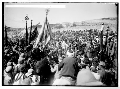 Costumes, characters, etc. Holy Neby Mousa (i.e., Nebi Musa) flag receiving the final blessing LOC matpc.05605