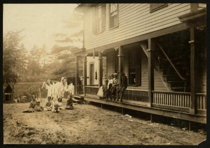 Cottage Street hovels down by the river in Easthampton, Mass., in which a great deal of home work is done on suspenders. LOC nclc.04266