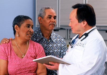 Couple consults with doctor
