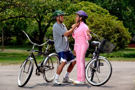 Couple preparing for bike ride (1) photo
