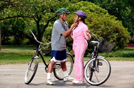 Couple preparing for bike ride