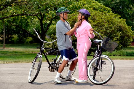 Couple preparing for bike ride (2) photo