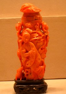 Covered Vase Decorated with Female Figure Holding Lingzhi Fungus and Peony Branch, Accompanied by a Boy, a Crane, and a Deer, China, Qing dynasty, 18th century, coral - Worcester Art Museum - IMG 7546