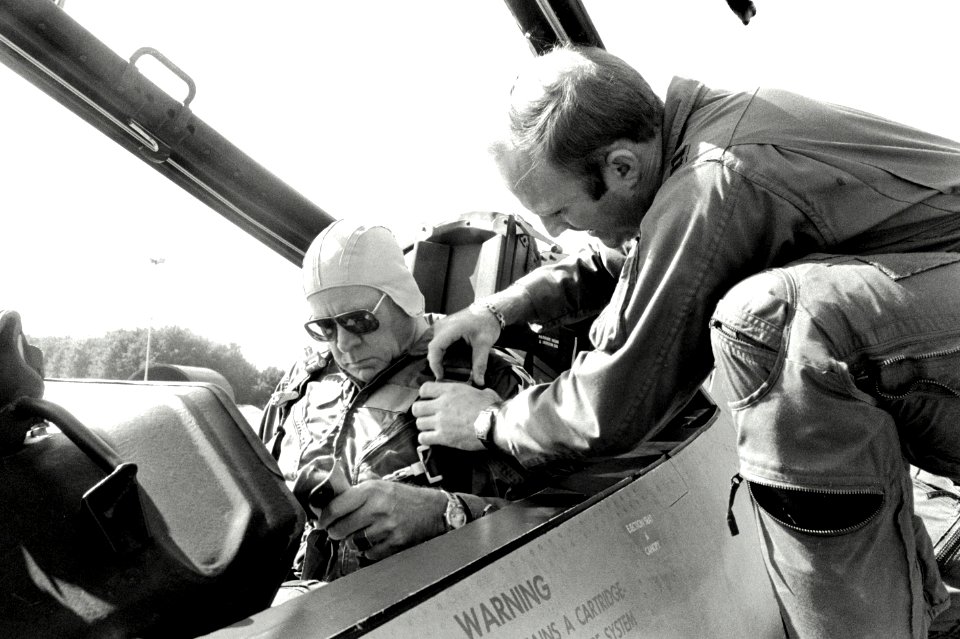 CPT Denny Granquist of the 32nd Tactical Fighter Squadron helps Ambassador to Belgium Charles H. Price with final preparations before his flight in an F-15D Eagle aircraft DF-SN-82-09028