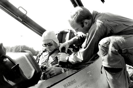 CPT Denny Granquist of the 32nd Tactical Fighter Squadron helps Ambassador to Belgium Charles H. Price with final preparations before his flight in an F-15D Eagle aircraft DF-SN-82-09028
