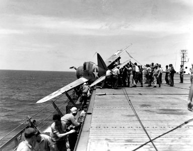 Crashed Brewster F2A-3 Buffalo of VMF-211 aboard USS Long Island (AVG-1), 25 July 1942 (80-G-12906)