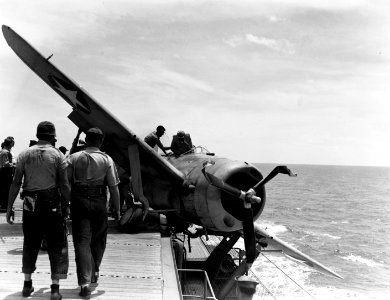 Crashed Brewster F2A-3 Buffalo of VMF-211 aboard USS Long Island (AVG-1) on 25 July 1942 (80-G-12905)