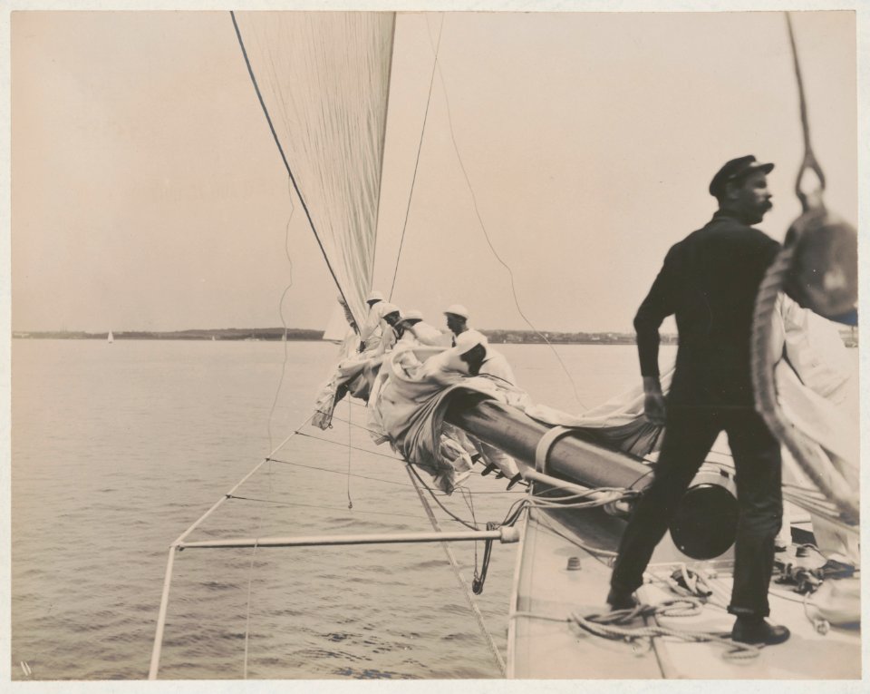 Crew furling the jib on the yacht Reliance, winner of 1903 America's Cup LCCN2007682241