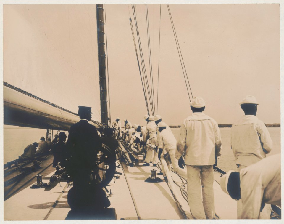 Crew handling sail on the yacht Reliance, winner of 1903 America's Cup LCCN2018645924