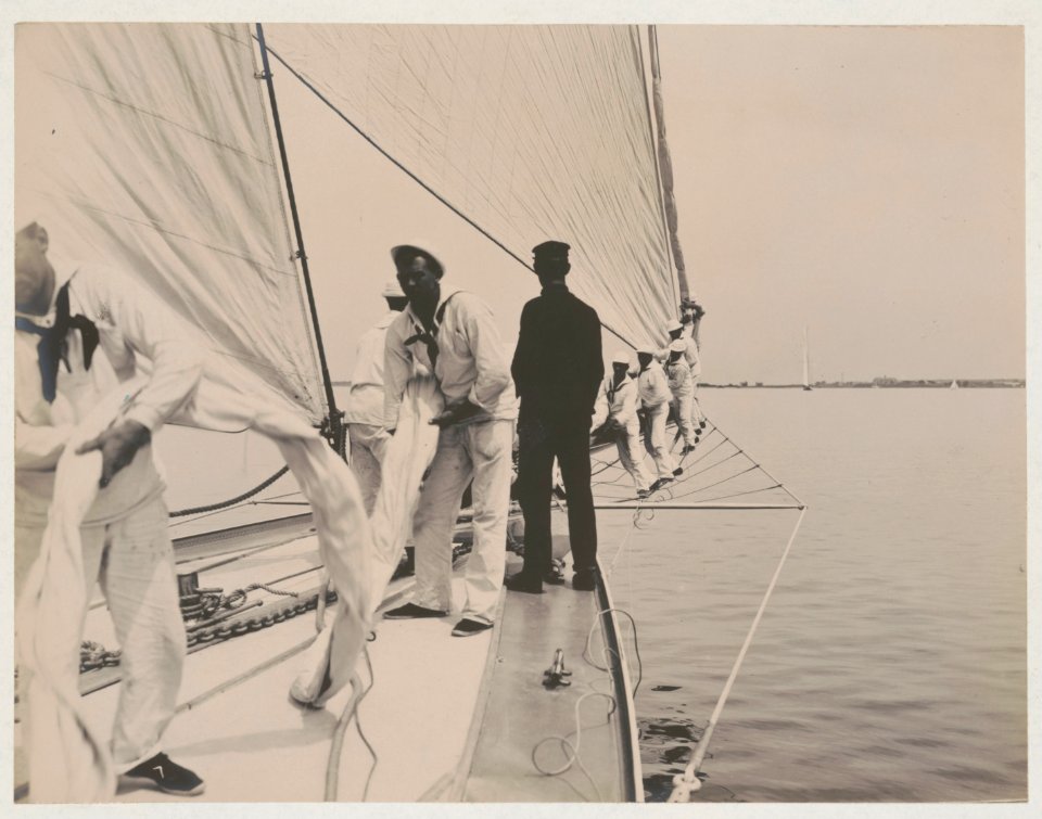 Crew handling sail on the yacht Reliance, winner of 1903 America's Cup LCCN2018645921