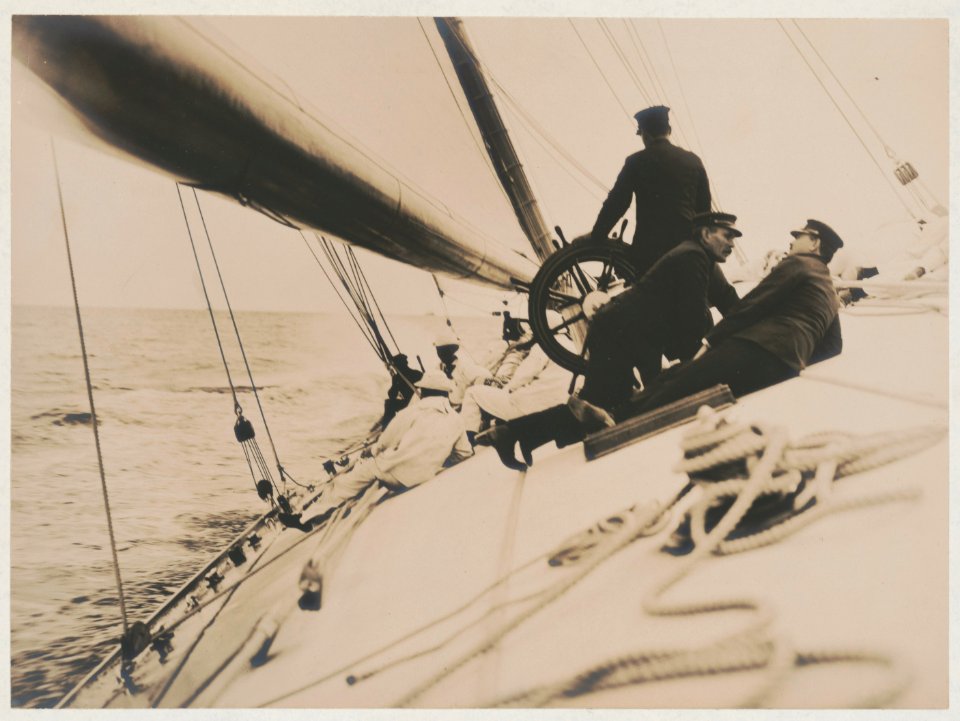 Crew lying on tilting deck of the yacht Reliance, winner of 1903 America's Cup LCCN90709775