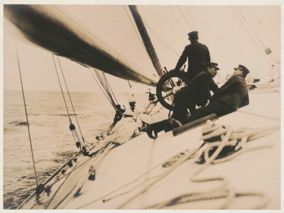 Crew lying on tilting deck of the yacht Reliance, winner of 1903 America's Cup LCCN90709775