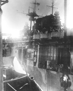 Crew members of USS Hornet (CV-8) prepare to abandon ship on 26 October 1942 (80-G-34110)