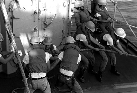 Crewmen aboard USS Dewey (DDG-45) participate in highlining operations on 1 June 1979 (6351880)