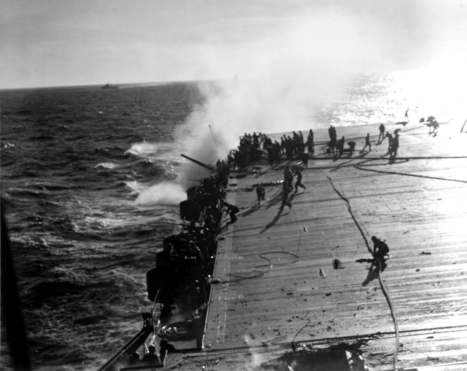 Crewmen fight fire on USS Enterprise (CV-6) on 24 August 1942 (NH 102096)