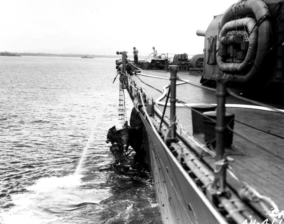 Crewmen working on the damaged bow of USS Chicago (CA-29) after the Battle of Savo Island on 9 August 1942