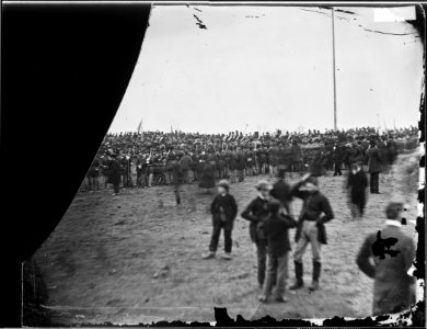 Crowd of citizens, soldiers, and etc. with Lincoln at Gettysburg. - NARA - 529085 photo