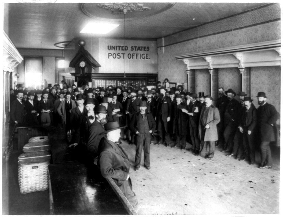 Crowd of people in post office LCCN99400310