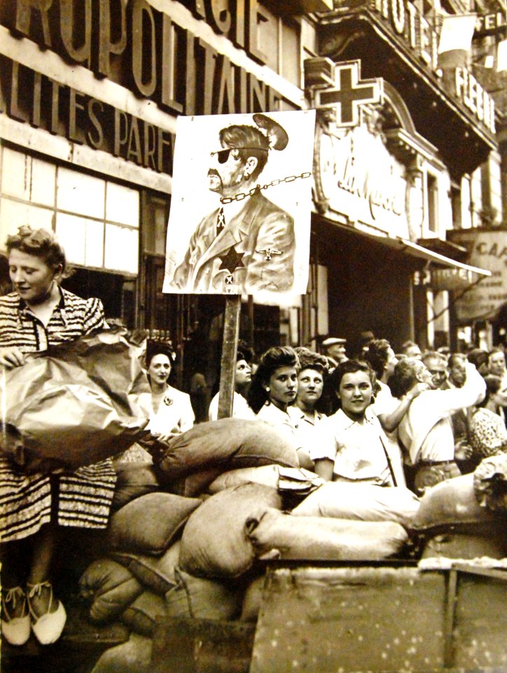 Crowd of people after liberation of Paris, France, August 25, 1944 (19563791486)