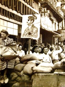 Crowd of people after liberation of Paris, France, August 25, 1944 (19563791486)
