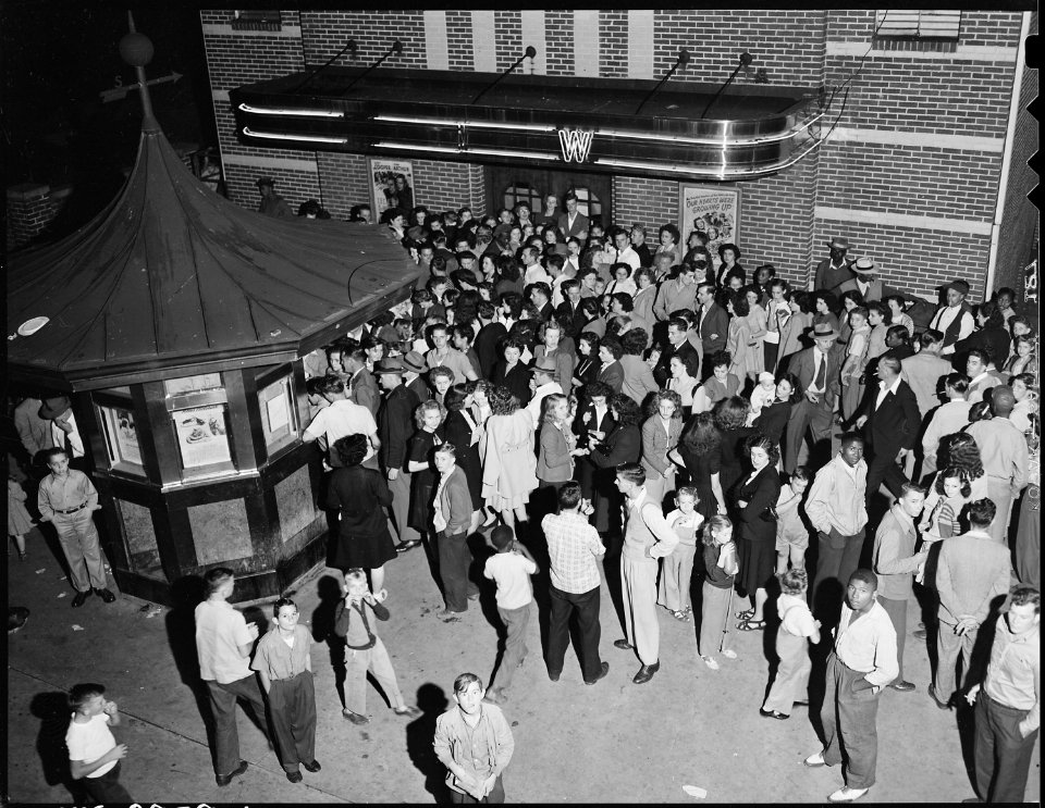Crowd waiting to attend movie showing on Saturday night. Inland Steel Company, Wheelwright ^1 & 2 Mines, Wheelwright... - NARA - 541429