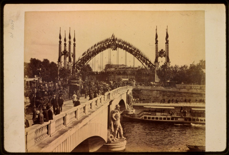 Crowds crossing the Pont de l'Alma, looking toward the Passerelle de l'Alma on the Quay d'Orsay, Paris Exposition, 1889 LCCN91722267