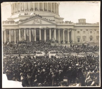 Crowds outside and atop the U.S. Capitol listen to President Theodore Roosevelt speaking at his inauguration LCCN2009634020