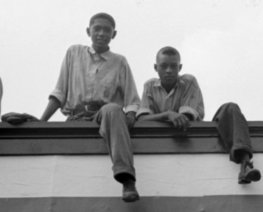 CrowleyNegroBoysOnBillboardRussellLee (cropped)