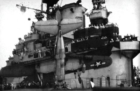 Curtiss SB2C Helldiver is stopped by the crash barrier aboard USS Hancock (CV-19), circa in 1944