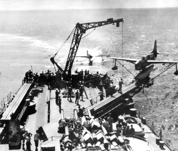 Curtiss SO3C returns to USS Biloxi (CL-80) in 1943 photo