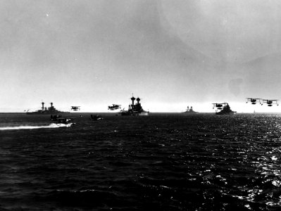 Curtiss SOC Seagull floatplanes taking off during a Fleet Review honoring the American Legion, circa in 1939 (NHF-094.01)