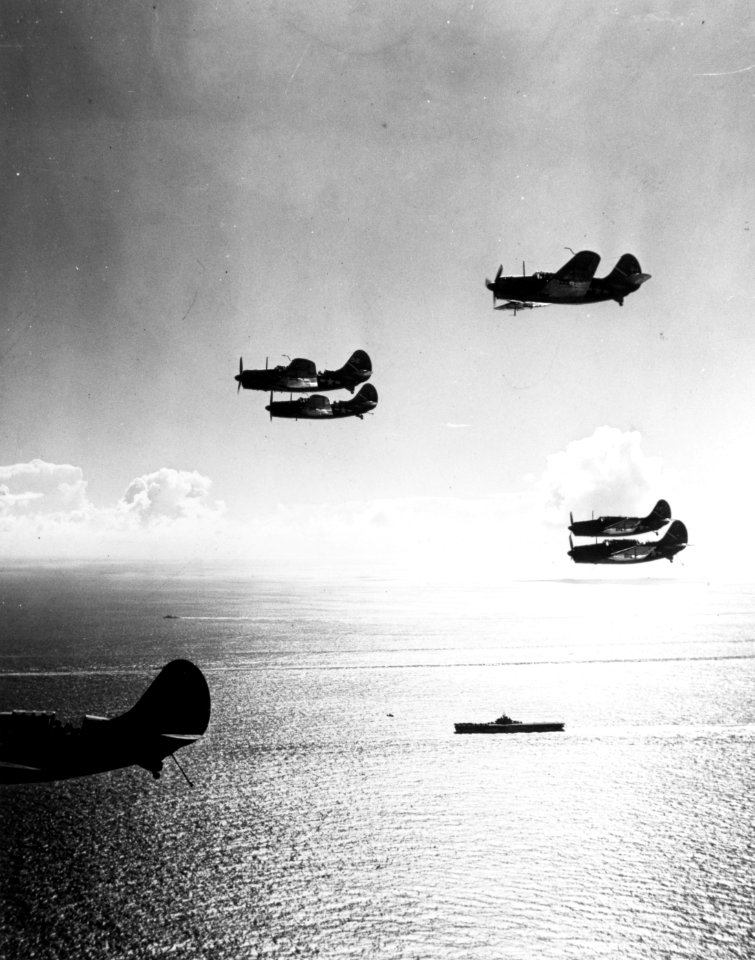 Curtiss SB2C-1 Helldivers of VB-1 return to USS Yorktown (CV-10), in July 1944 (80-G-241043)