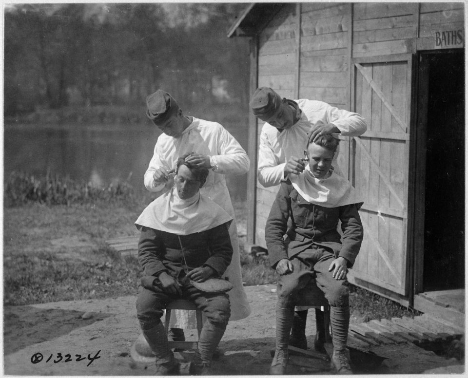 Cutting hair at the camp. 166th Field Hospital, Baccarat, France., 05-15-1918 - NARA - 530725