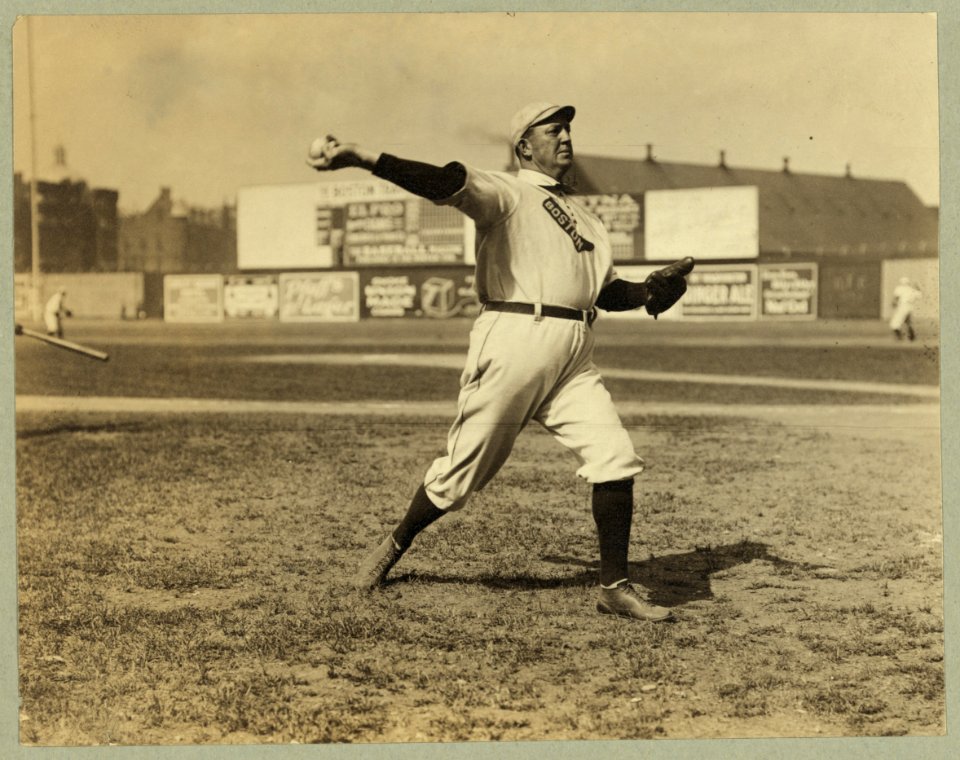 Cy Young, Boston AL, full-length portrait, standing, facing right, throwing baseball LCCN97518653