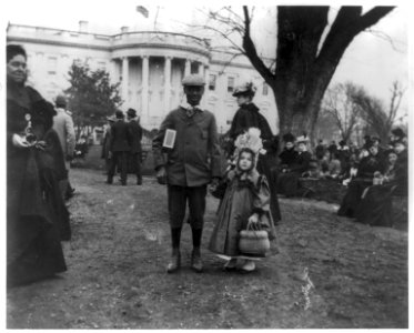 D.C. Wash. - White House - Negro boy holding hand of small white girl during Easter egg roll LCCN2007678673