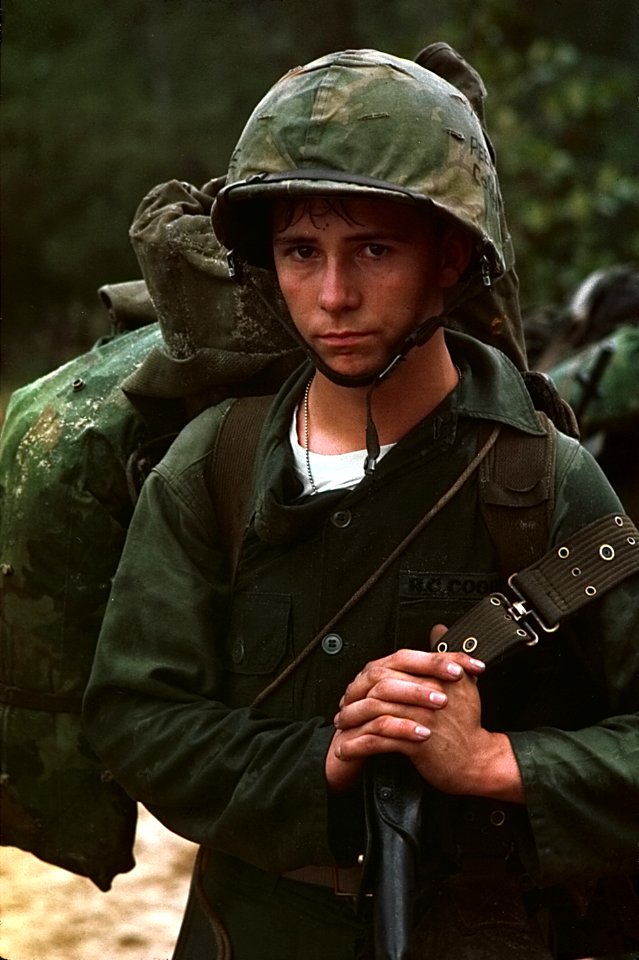 Da Nang, Vietnam. A young Marine private waits on the beach during the Marine landing. - NARA - 532432 (restored)